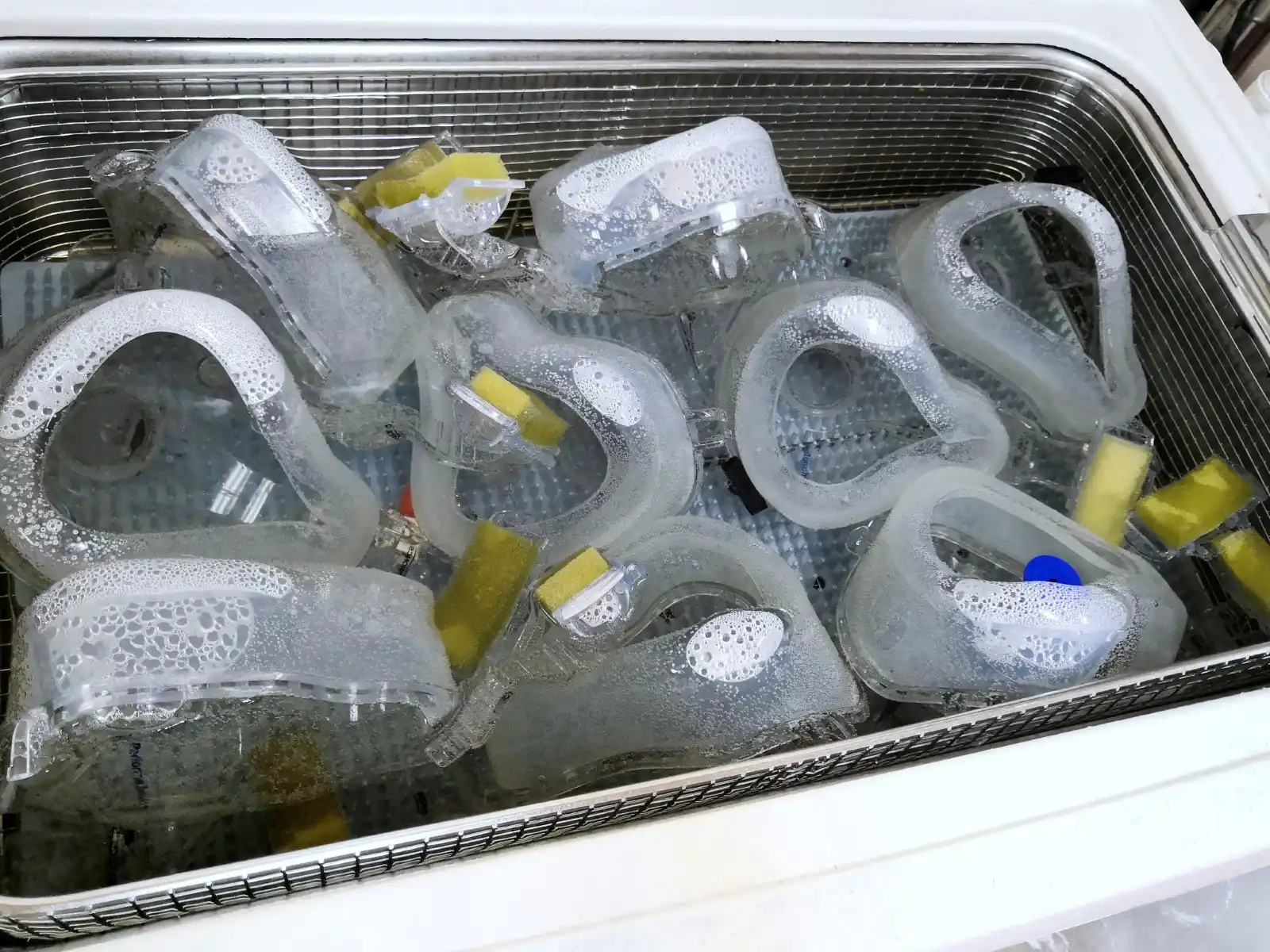 Ultrasonic cleaning of respiratory equipment